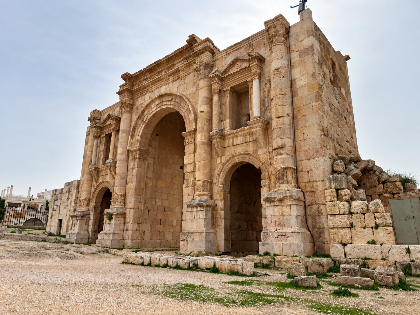 Ancient stone arch with an empty forecourt